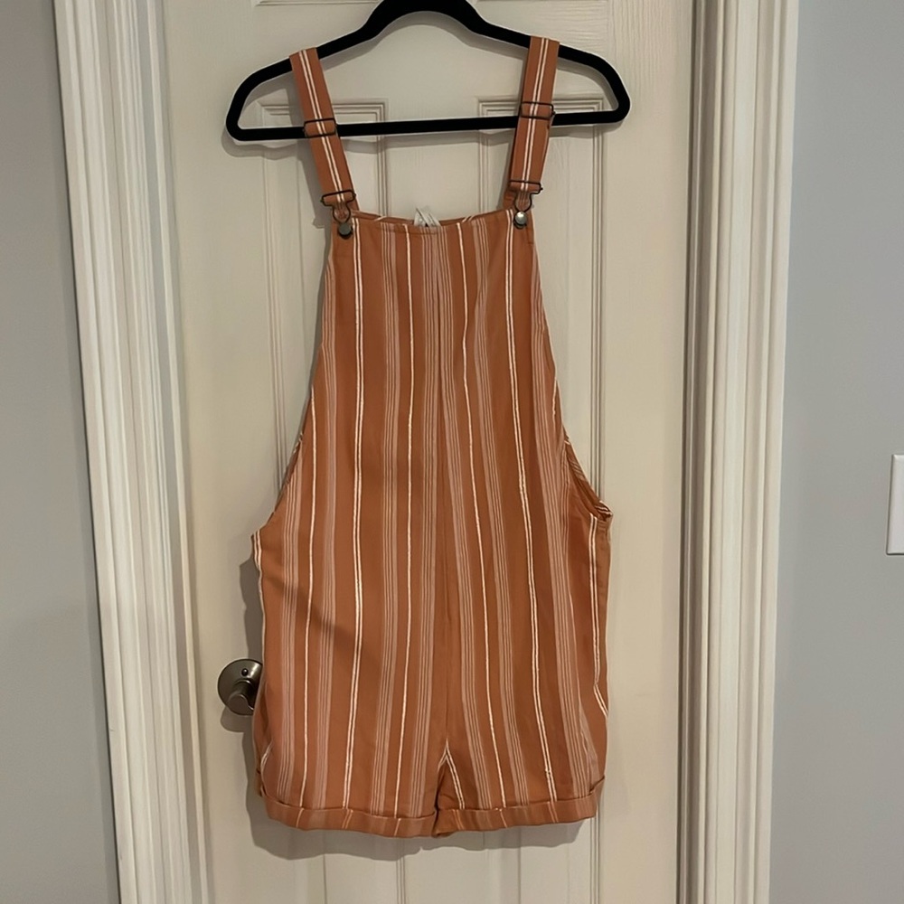 Roxy orange and white overalls.